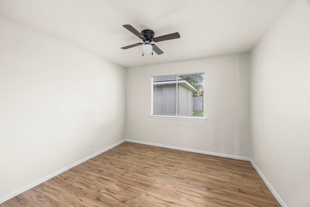 6114 Elkwood Forest Dr, Houston, TX 77088 - unfurnished room with wood finished floors and ceiling fan