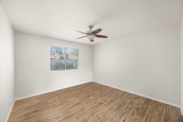 6114 Elkwood Forest Dr, Houston, TX 77088 - spare room featuring wood finished floors and a ceiling fan