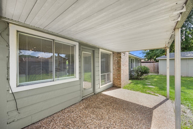 6114 Elkwood Forest Dr, Houston, TX 77088 - view of patio / terrace with a storage unit