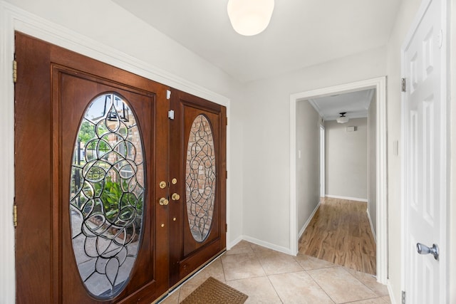 6114 Elkwood Forest Dr, Houston, TX 77088 - entrance foyer with baseboards and light tile patterned floors