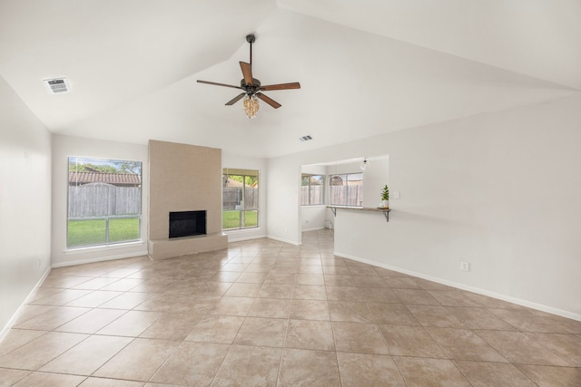 6114 Elkwood Forest Dr, Houston, TX 77088 - unfurnished living room featuring ceiling fan, light tile patterned floors, a large fireplace, and high vaulted ceiling