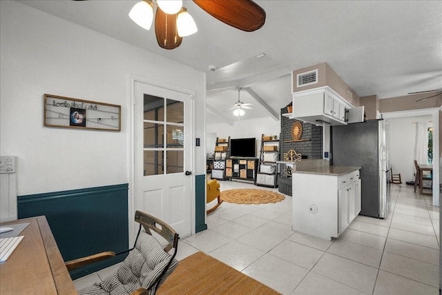 431 Shadow Creek Dr, El Lago, TX 77586 - kitchen featuring a ceiling fan, white cabinetry, light countertops, and light tile patterned floors