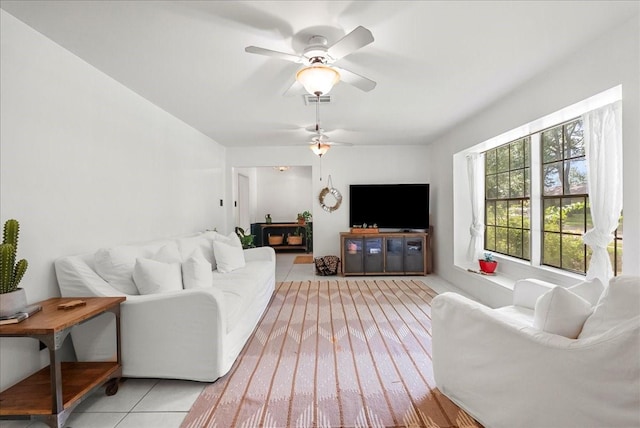 431 Shadow Creek Dr, El Lago, TX 77586 - living area featuring ceiling fan and light tile patterned floors