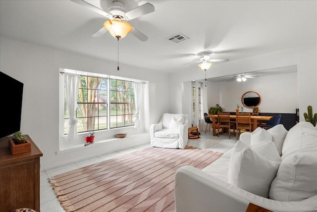 431 Shadow Creek Dr, El Lago, TX 77586 - living room featuring a ceiling fan and light tile patterned floors