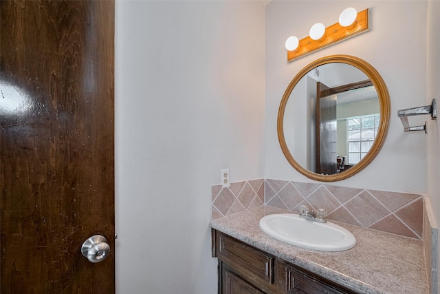 1015 Devonport Ln, Seabrook, TX 77586 - bathroom with decorative backsplash and vanity