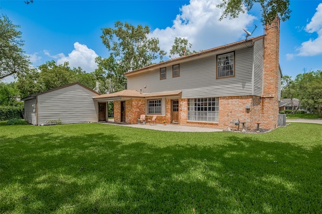 1015 Devonport Ln, Seabrook, TX 77586 - back of property with a yard, a chimney, a patio, and brick siding