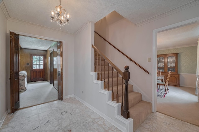 1015 Devonport Ln, Seabrook, TX 77586 - entryway with a textured ceiling, stairway, a chandelier, ornamental molding, and light colored carpet