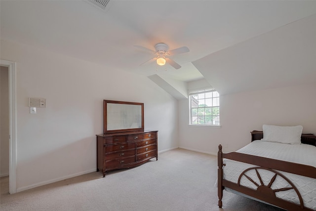 1015 Devonport Ln, Seabrook, TX 77586 - bedroom with light carpet, ceiling fan, and vaulted ceiling
