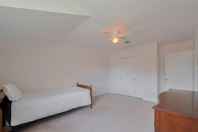 1015 Devonport Ln, Seabrook, TX 77586 - unfurnished bedroom with light colored carpet, a ceiling fan, a closet, and lofted ceiling