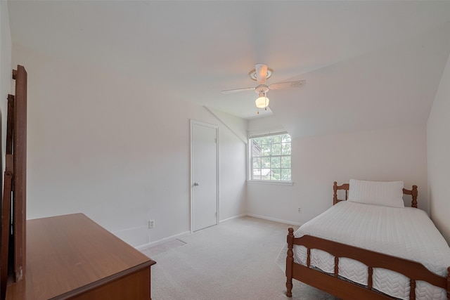 1015 Devonport Ln, Seabrook, TX 77586 - bedroom featuring light carpet, a ceiling fan, and lofted ceiling