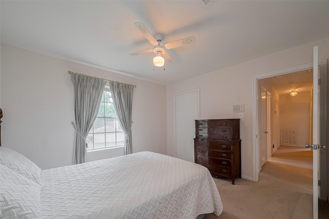 1015 Devonport Ln, Seabrook, TX 77586 - bedroom with attic access, light colored carpet, and ceiling fan