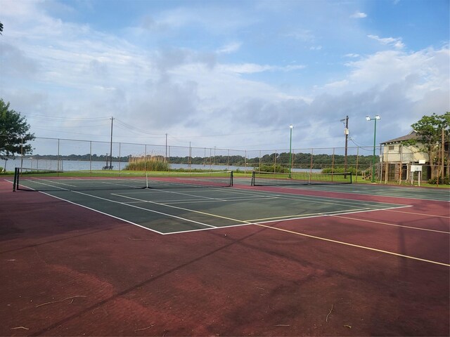 1015 Devonport Ln, Seabrook, TX 77586 - view of tennis court featuring community basketball court