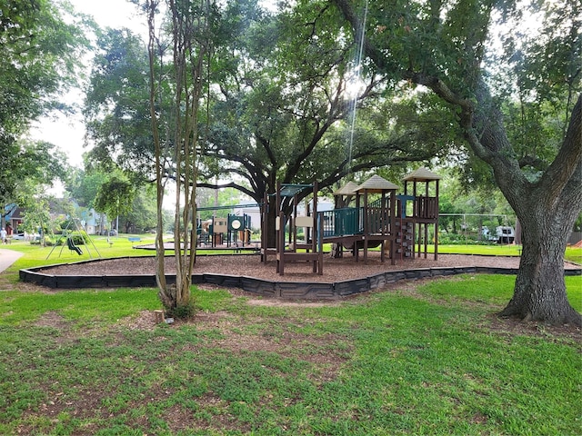 1015 Devonport Ln, Seabrook, TX 77586 - communal playground featuring a yard