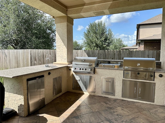 4314 Madera Creek Ln, Katy, TX 77494 - fenced backyard featuring area for grilling and a patio