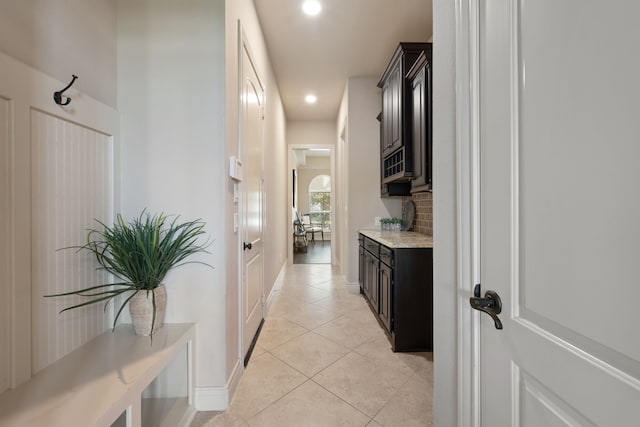 4314 Madera Creek Ln, Katy, TX 77494 - hallway with light tile patterned floors and recessed lighting