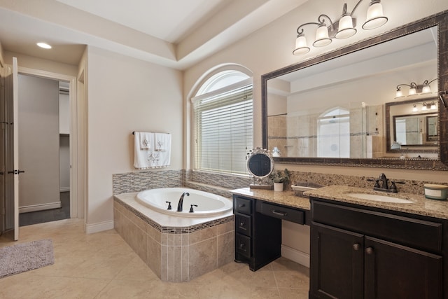 4314 Madera Creek Ln, Katy, TX 77494 - bathroom with vanity, a garden tub, tiled shower, and tile patterned flooring