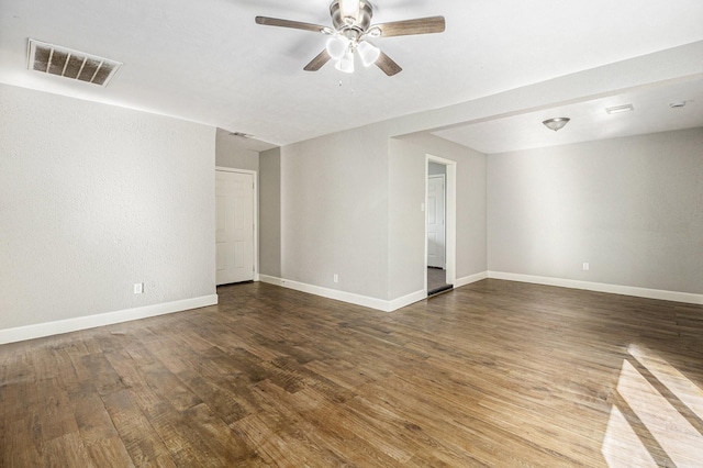 5715 Willow Glen Dr, Houston, TX 77033 - empty room with wood finished floors and a ceiling fan
