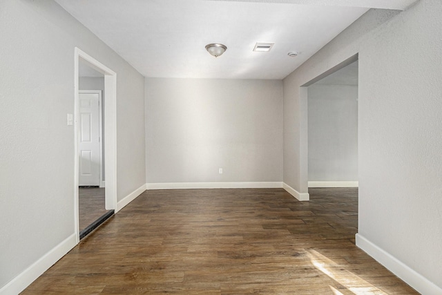 5715 Willow Glen Dr, Houston, TX 77033 - empty room featuring wood finished floors and baseboards