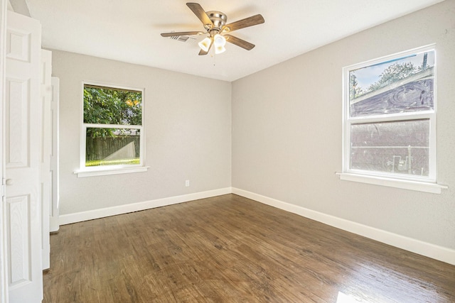 5715 Willow Glen Dr, Houston, TX 77033 - spare room with dark wood-style flooring and a ceiling fan