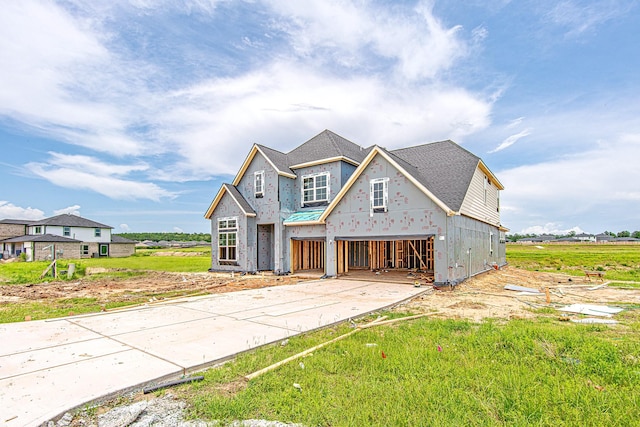 153 Peninsula Point Dr, Montgomery, TX 77356 - property under construction featuring concrete driveway