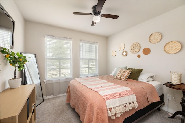 2426 Gentle Breeze Ln, Baytown, TX 77523 - bedroom with light carpet and ceiling fan