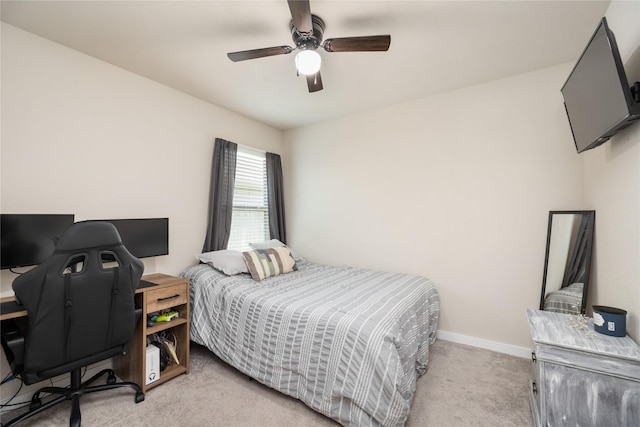 2426 Gentle Breeze Ln, Baytown, TX 77523 - bedroom featuring light colored carpet, ceiling fan, and a desk