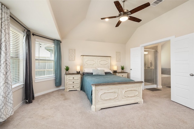 2426 Gentle Breeze Ln, Baytown, TX 77523 - bedroom with lofted ceiling, light colored carpet, connected bathroom, and a ceiling fan