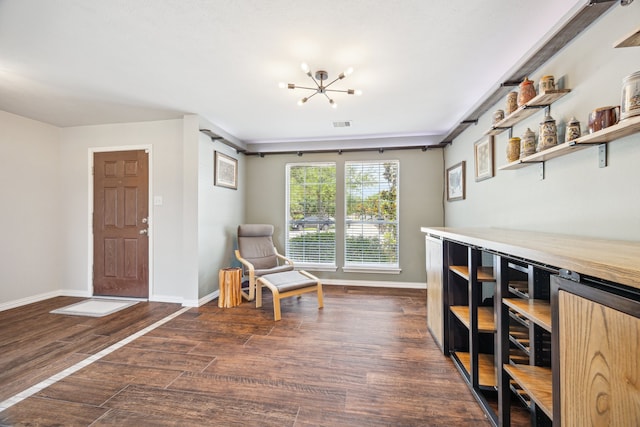 3282 Bend Cove Ct, League City, TX 77573 - living area featuring dark wood-style floors and a chandelier