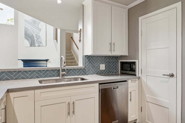 3282 Bend Cove Ct, League City, TX 77573 - kitchen with dishwasher, built in microwave, tasteful backsplash, white cabinetry, and light countertops