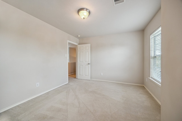 3282 Bend Cove Ct, League City, TX 77573 - unfurnished room with plenty of natural light and carpet flooring