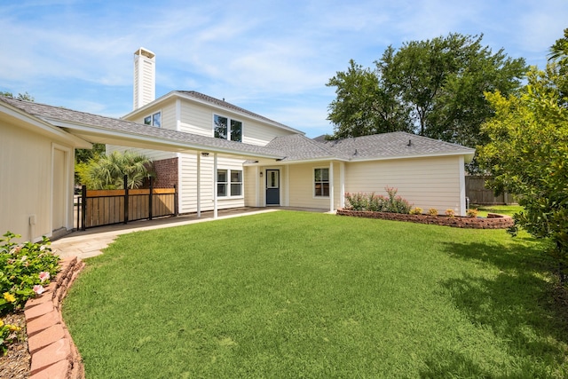 3282 Bend Cove Ct, League City, TX 77573 - back of house with a patio, roof with shingles, and a chimney