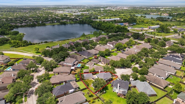 3282 Bend Cove Ct, League City, TX 77573 - aerial view of residential area with a large body of water and property boundaries highlighted