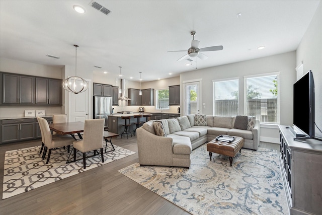 1507 Biondo Way, Houston, TX 77008 - living area featuring wood finished floors, a ceiling fan, and recessed lighting
