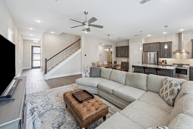 1507 Biondo Way, Houston, TX 77008 - living room with stairs, wood finished floors, ceiling fan, and recessed lighting