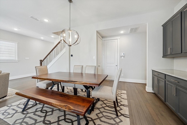 1507 Biondo Way, Houston, TX 77008 - dining room with wood finished floors, stairway, recessed lighting, and a chandelier