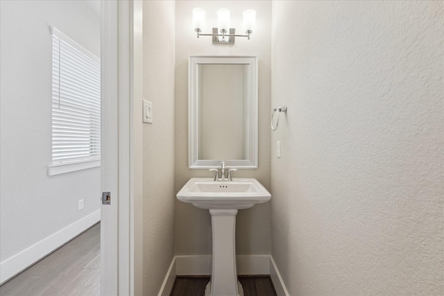 1507 Biondo Way, Houston, TX 77008 - bathroom featuring wood finished floors and baseboards