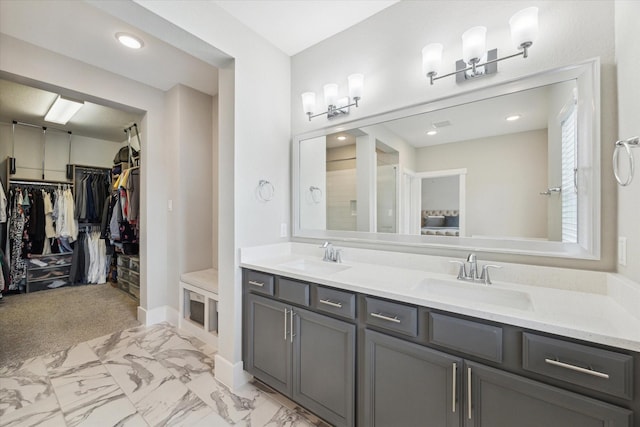 1507 Biondo Way, Houston, TX 77008 - bathroom featuring double vanity, a spacious closet, marble look tile flooring, a shower, and recessed lighting