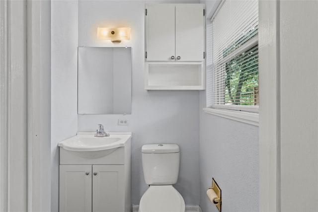 514 E Foley St, Alvin, TX 77511 - bathroom featuring vanity and toilet