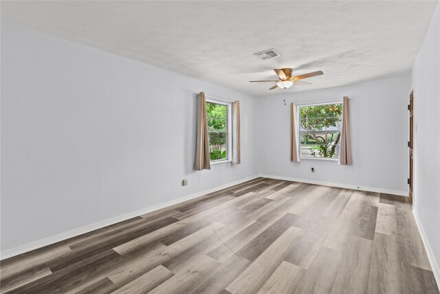 514 E Foley St, Alvin, TX 77511 - spare room with wood finished floors and ceiling fan