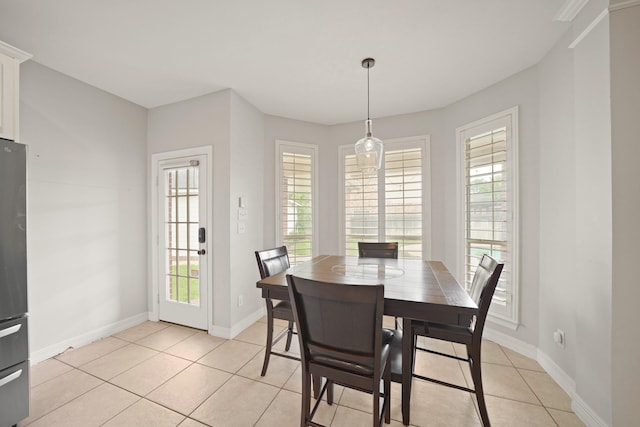 14210 Northface Manor Ct, Cypress, TX 77429 - dining space featuring healthy amount of natural light and light tile patterned floors