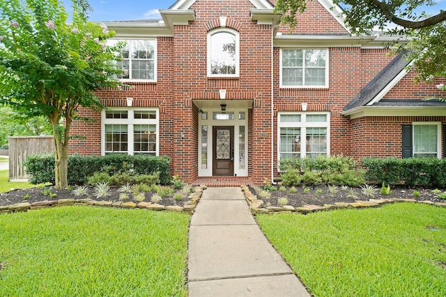 14210 Northface Manor Ct, Cypress, TX 77429 - view of front facade featuring a front yard and brick siding