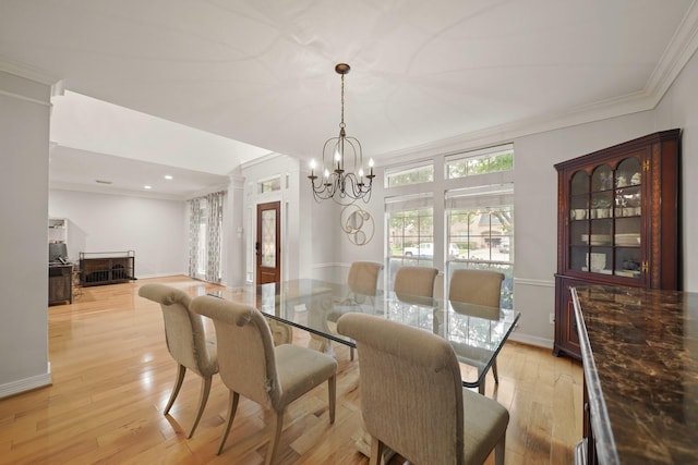 14210 Northface Manor Ct, Cypress, TX 77429 - dining room with a chandelier, light wood-style flooring, crown molding, ornate columns, and recessed lighting