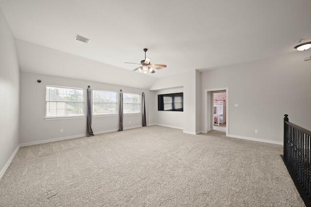 14210 Northface Manor Ct, Cypress, TX 77429 - unfurnished living room featuring light carpet, ceiling fan, and vaulted ceiling