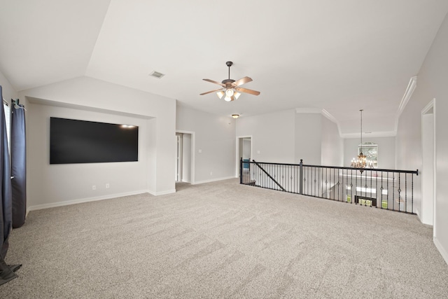 14210 Northface Manor Ct, Cypress, TX 77429 - spare room featuring a chandelier, carpet floors, ceiling fan, vaulted ceiling, and ornamental molding