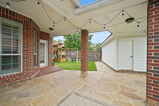 14210 Northface Manor Ct, Cypress, TX 77429 - view of patio with a playground