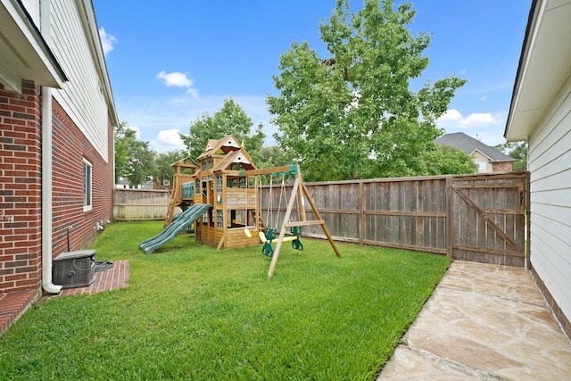 14210 Northface Manor Ct, Cypress, TX 77429 - fenced backyard featuring a playground