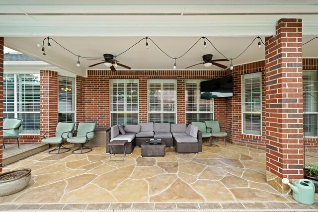 14210 Northface Manor Ct, Cypress, TX 77429 - view of patio featuring a ceiling fan and an outdoor living space