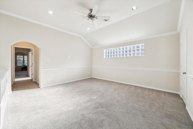 831 W 26th St, Houston, TX 77008 - unfurnished room featuring light carpet, ornamental molding, arched walkways, a ceiling fan, and lofted ceiling