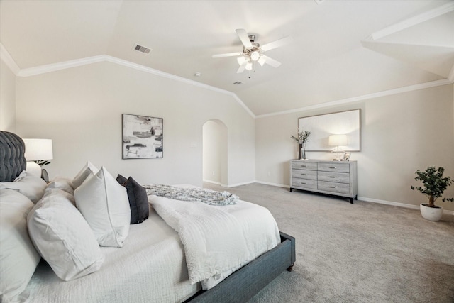 831 W 26th St, Houston, TX 77008 - carpeted bedroom with vaulted ceiling, arched walkways, crown molding, and a ceiling fan