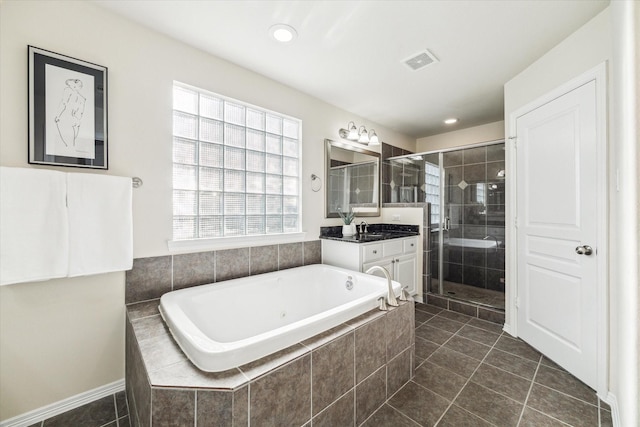 831 W 26th St, Houston, TX 77008 - bathroom featuring vanity, a shower stall, a whirlpool tub, plenty of natural light, and recessed lighting
